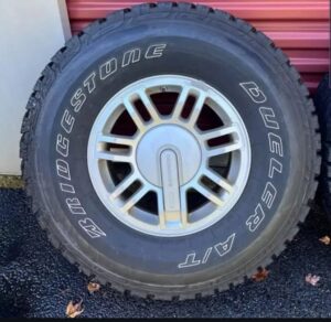 Hummer H3 tires and rims and lug nuts.. 5
Bridgestone duelers and stock rims.