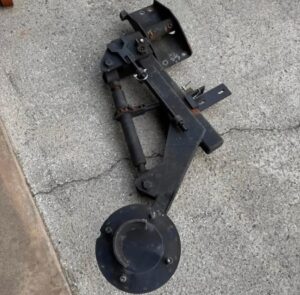 tire carrier with pins to secure it