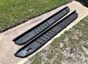 set of OEM running boards that came off a 2024 Ranger Raptor. These are the factory Raptor-specific running boards.